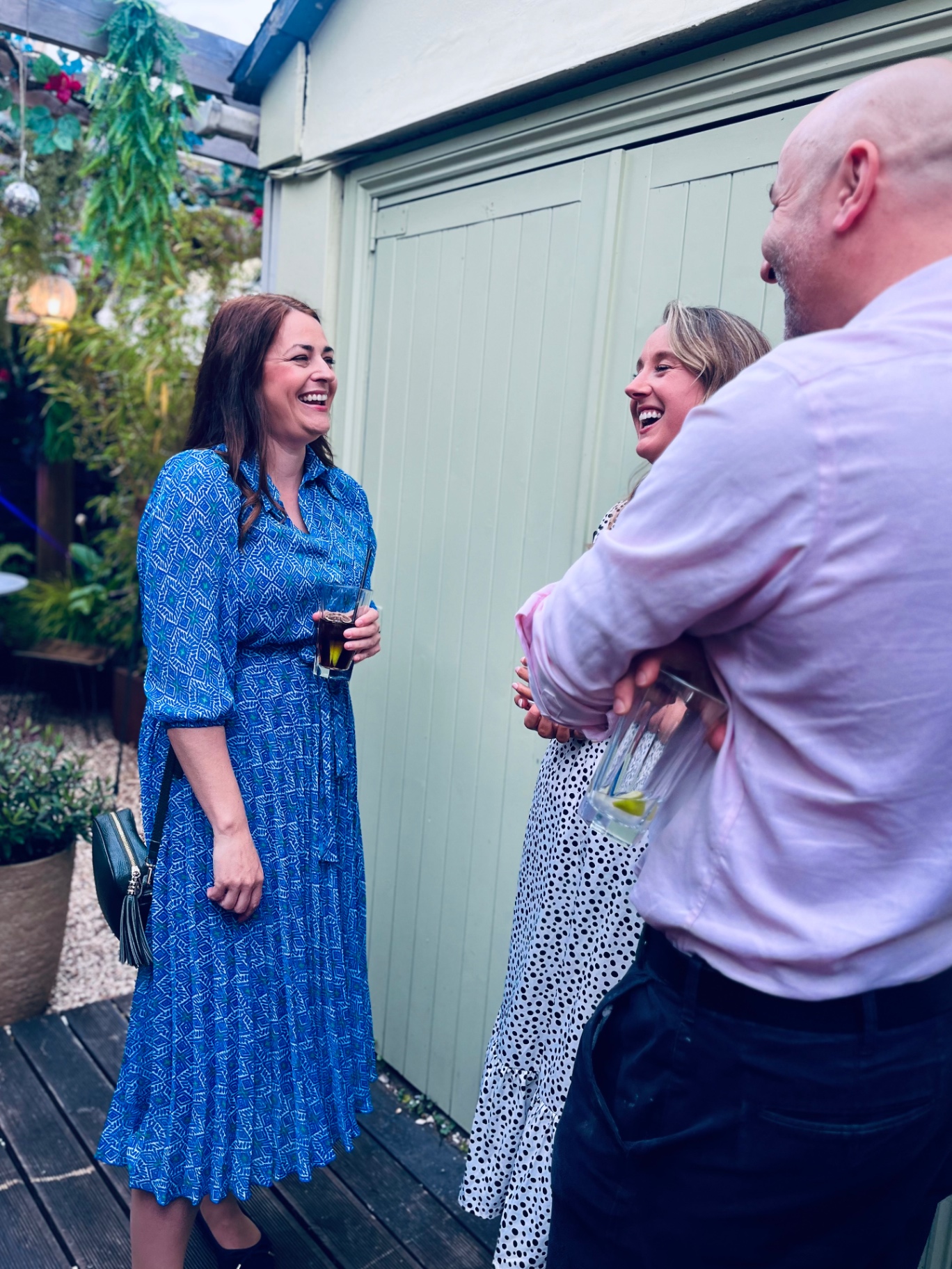 Members laughing together at the lounge