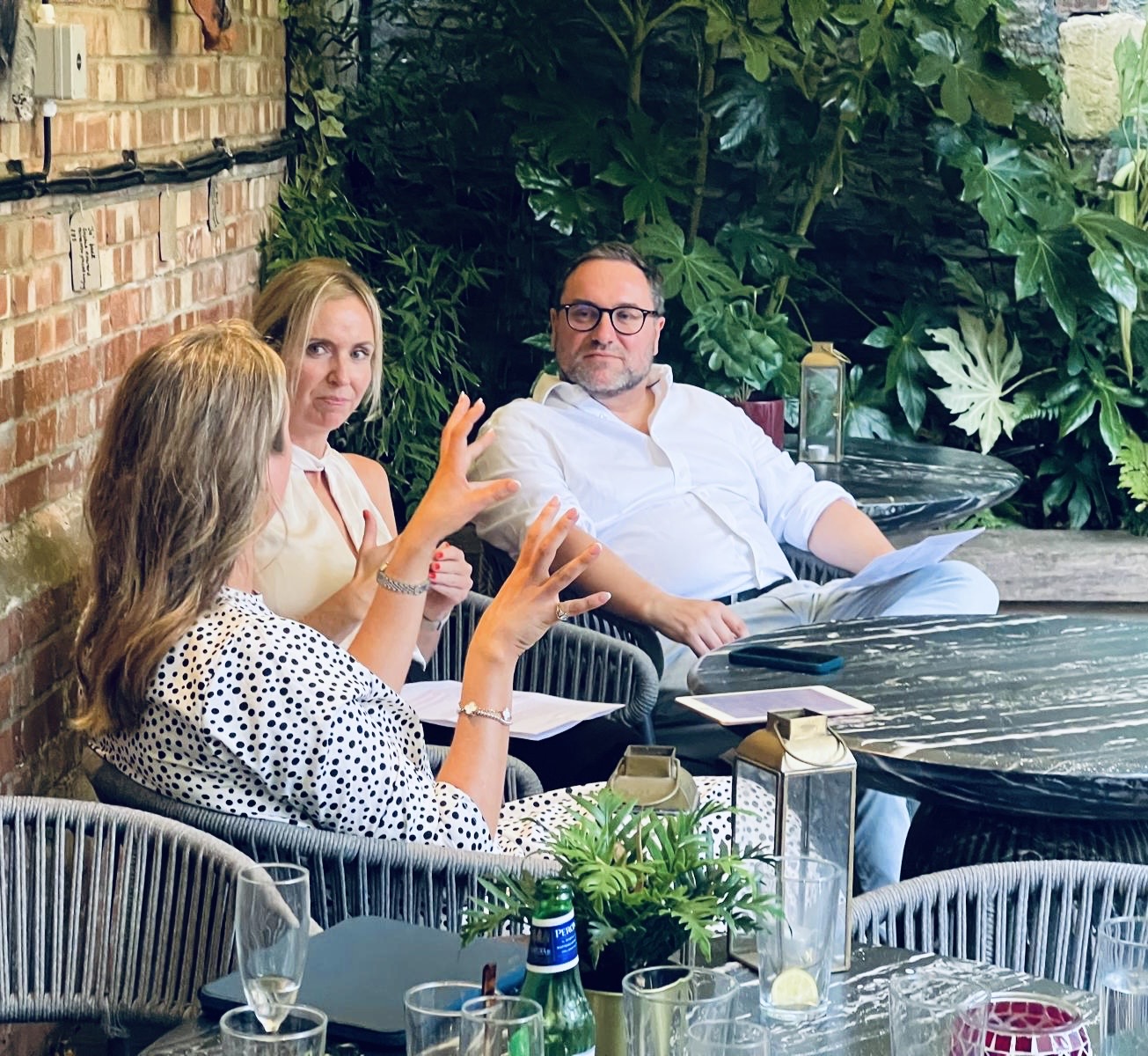 Fireside chat in the garden with hosts and speaker